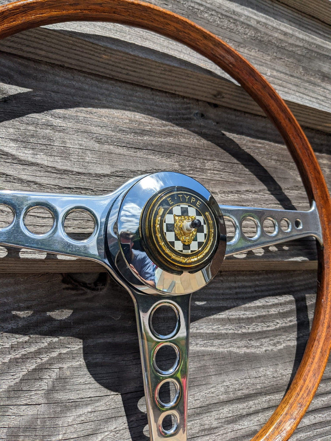Genuine E-type steering wheel clock with genuine center badge.