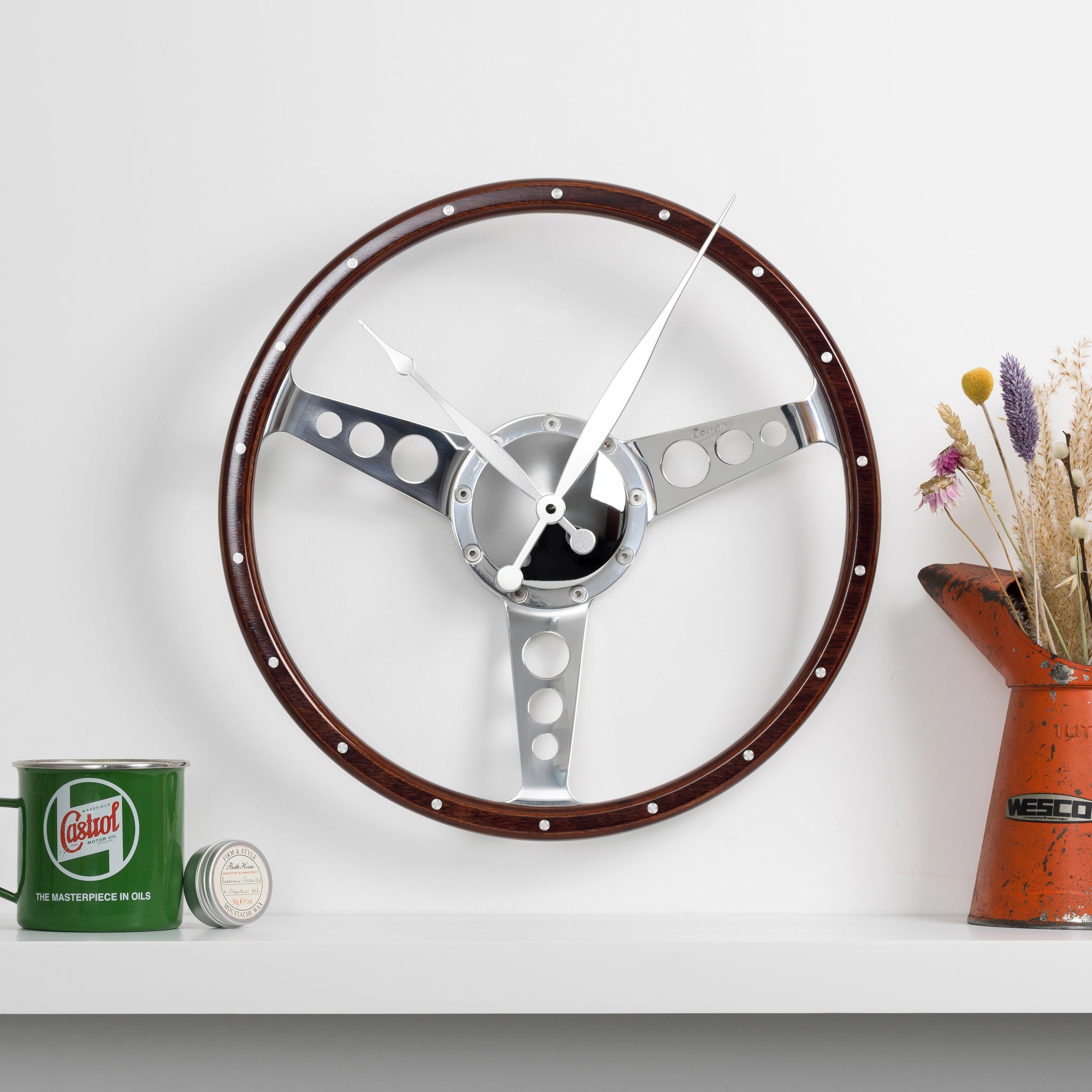 Classic car polished wooden steering wheel clock. Customers choice of car badge.